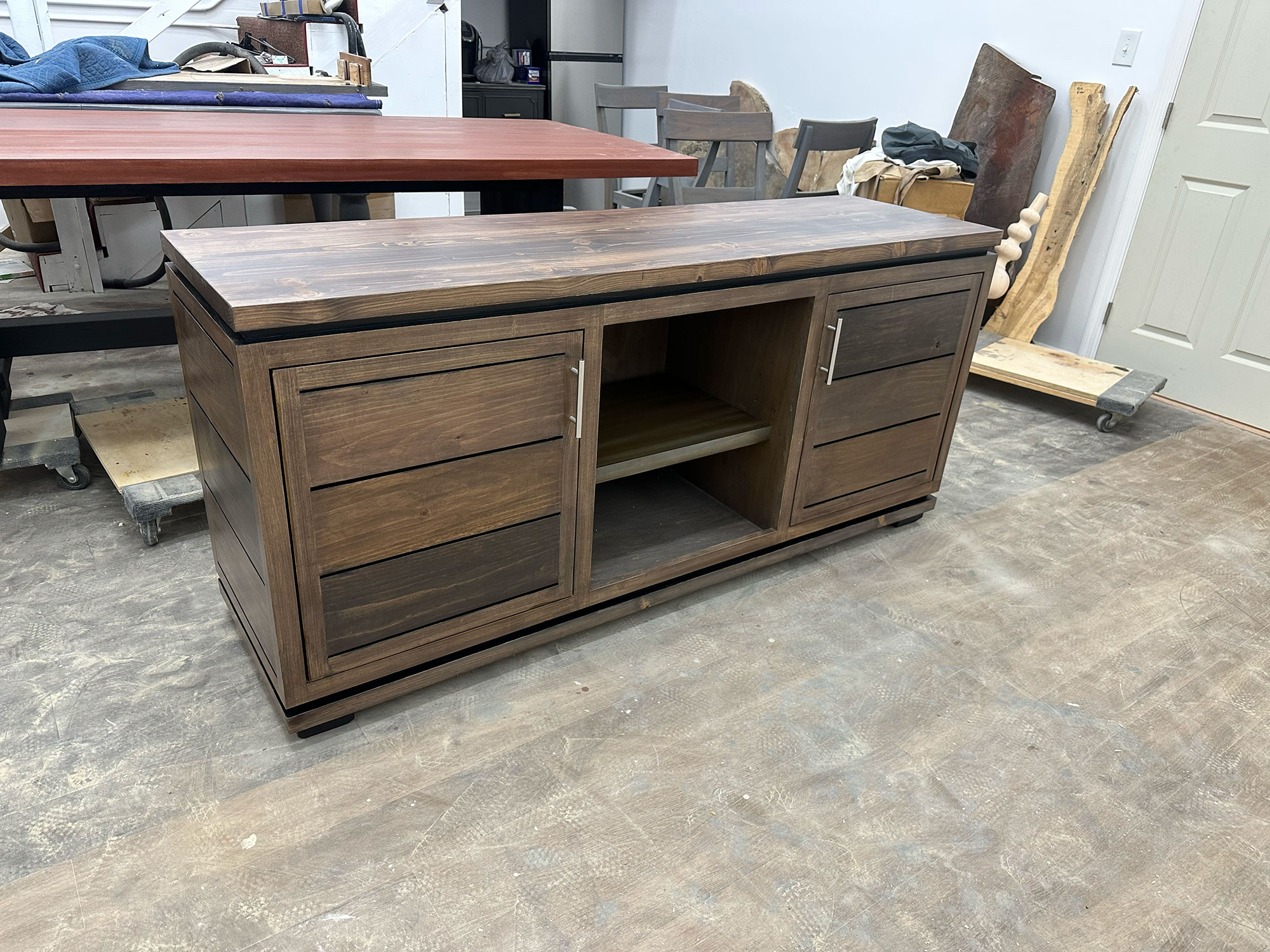 The Matanzas Sideboard brings warmth and structure to any room with its solid hardwood build and timeless, panel-accented design.